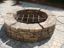 The crushed stone underneath the fire pit, the rustic picnic table atop the paver patio and the natural. Top 40 Diy Fire Pit Ideas Stacked Inground And Above Ground Designs