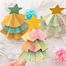 The download includes templates for 10 different ornaments in varying sizes, ranging from about 5 to 10 cm in height (finished size). Diy Paper Tree Ornaments With Template Hello Wonderful