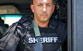 Video shows Sheriff Marceno accepting stack of cash from ex-'ghost  employee'; Marceno's lawyer says transaction was legitimate