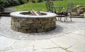 Wood Burning Natural Stone Fire Pit In Pool Area Fire Pit In Pool Stone Fire Pit Fire Pit