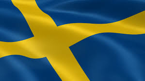 The flag of sweden consists of a yellow or gold nordic cross on a field of light blue. Shutterstock