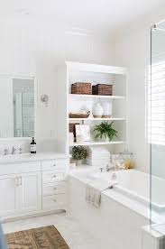 White Shiplap Bathroom Featuring A Dual Washstand With A White And Gray Marble Counte Traditional Bathroom Elegant Bathroom Design Traditional Bathroom Designs