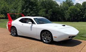 It's been banned by the nhra. 2013 Dodge Challenger With Daytona Body Kit Headed To Auction