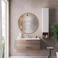 Glass brick accents and angled wall creates a focal point for this walk in shower with bench and don't miss the tile detail on the round corner tub and warm wood cabinets, creating a relaxing environment. Neu Type Medium Round Gold Shelves Drawers Modern Mirror 24 In H X 24 In W Jj00514zzen 1 The Home Depot