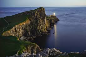 It is said that the causeway extends under the sea from northern ireland to the isle of skye. Neist Point Lighthouse In Isle Of Skye Scotland Seen At Blue Hour Photograph By George Afostovremea