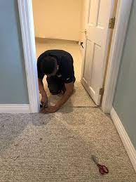 Smooth out the carpet over the doorway and feel it with your hands to locate the area where it meets the other type of flooring. Repairing Carpet Seam In A Doorway Mss Cleaning