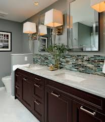 More of the same marble lines the shower walls behind the glass door. Modern Backsplash Ideas For Your Bathroom Renocompare