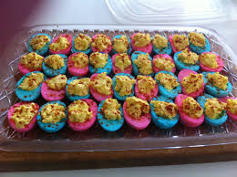 In fact, they only date back as far as 2008, when lifestyle blogger jenna karvunidis revealed the gender of her unborn child via two coloured cup cakes — which by today's standards is the height of restraint and tastefulness. Baby Shower Gender Reveal Party Food Gender Reveal Food Baby Reveal Party