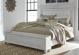 In a beautifully distressed whitewashed finish you'll love sleeping in casual style. Kanwyn Whitewash Queen Panel Storage Bedroom Set Lexington Overstock Warehouse