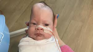 Ethan McElhenny underwent complex surgery after spina bifida diagnosis