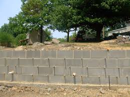 Reinforced concrete block retaining walls are a convenient way of building vertical retaining walls. Concrete Block Retaining Wall Picture Of A 32 In High Conc Flickr