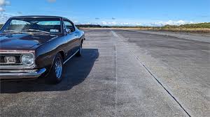 Image result for Black 1967 Barracuda
