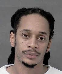 Murder Suspect Considered Armed, Dangerous Turns Himself In