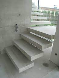 Floating Concrete Stairs And Landing Stairs We Love At Design Connection Inc Kansas City Interior Desig Concrete Stairs Concrete Staircase Floating Stairs