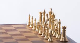 Metal chess sets seem somehow more solid, more impressive, and they are guaranteed to make an impression. Gold And Silver Chess Set Stock Photo Image Of Gold 130242256