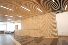 Opt for bold walnut wood ceilings to create a cozy kitchen space. Wood Ceilings Wood Slat Ceiling Ceiling Wood