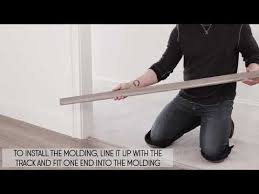 This product clicks together and floats, much like laminate. 2 How To Install 3 N 1 Vinyl Flooring Molding Transition Strips Diy Flooring Installation Youtube Vinyl Flooring Transition Strips Diy Flooring
