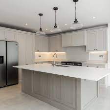 This leaves room for a contrasting hue in the cabinet hardware. Sophisticated Traditional Light Grey Handmade Kitchen With Large Island Grey Kitchen Diner Beige Kitchen Grey Kitchen Designs