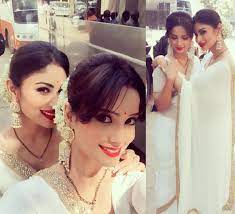 Mouni And Adaa Dress Alike To Shoot Special Sequence For Naagin Mouni Roy Dresses White And Gold Saree Beautiful Indian Actress Adaa khan is the daughter of abbas khan and parvin khan. pinterest