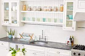 The microwave has an exhaust hood underneath it for. How To Organize Kitchen Cabinets