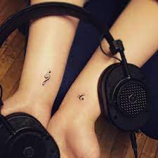 They come in all shapes, sizes and colors. Bass And Treble Clef Tattoos On Both Wrists