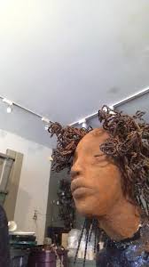 Artist Lester Jones explains how he uses 16 gauge wire incorporating it  into his female sculptures. #HerdewLester Jones Raku Sculptures Herdew