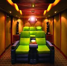 This space feels like a private haven fit for big viewing parties thanks to the full carpeting and modular seating. Small Theater Home Theater Room Design Home Cinema Room Home Theater Rooms