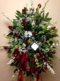 Fresh Funeral Spray Using Red Roses Bells Of Ireland White Larkspur And Baby S Breath Funeral Sprays Funeral Flowers Flowers For You