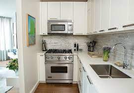 Fill any gaps with filler and sand smooth. Painting Laminate Cabinets Dos And Don Ts Bob Vila