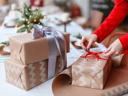 Finish wrapping the gift by pulling the final fold over the final side of the package—this is where you'll tape and secure the entire wrapped gift. Professional Gift Wrapping Service Taskrabbit