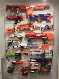 Upgrade your nerf battles to the elite level with this rack to organize your gear, making each battle all the more realistic. Pegboard Nerf Gun Rack Online Discount Shop For Electronics Apparel Toys Books Games Computers Shoes Jewelry Watches Baby Products Sports Outdoors Office Products Bed Bath Furniture Tools Hardware Automotive