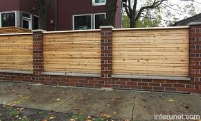 Renovate your wooden fence with renovator fence stain, the fastest way to stain your fence! Stylish Wood Fence With Brick Columns Picture Interunet Wood Fence Fence Design Brick Fence