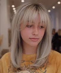 Who can recommend a haircut for long hair with layered cut and bangs?