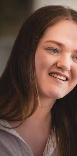 Early intervention programs to assist children with hearing loss develop  spoken language.