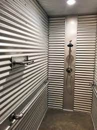Fiberglass shower pans make the most sense at floor level. Corrugated Metal Shower Walls Tin Shower Walls Tin Shower Galvanized Shower