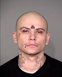 Official photos released of suspects connected to quadruple homicide