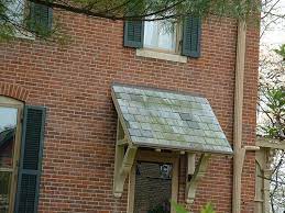 A Wood Shingle Awning Over The Window Wood Shingles Awning Over Door Awning