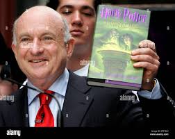 Sholastic Chairman, President and CEO Dick Robinson. holds up the first  author-signed American edition of the book, "Harry Potter and the  Half-Blood Prince," during an event at Scholastic's New York headquarters  Friday,