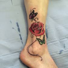Bite The Bullet Rose Tattoo Pin By Juanis Moreno On Tattoo Ideas Butterfly Ankle Tattoos Rose And Butterfly Tattoo Butterfly Tattoo