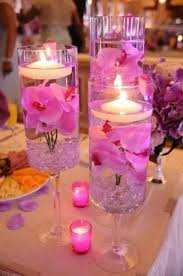 Agua, flores, velas y cristal. Centros De Mesa Con Velas Flotantes