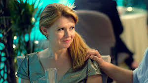 A wide angle shot of a train in a station with a parrot in one window and an almost out of sight sian gibson in the next one. Meet Sian Gibson Death On The Tyne Gold