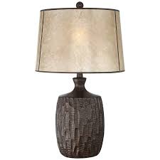 Crafted from resin that has a rustic gray wood look, the base is designed with a smooth, curved silhouette that's right at home in a farmhouse or nautical living room. Kelly Rustic Farmhouse Table Lamp With Mica Shade 32y49 Lamps Plus