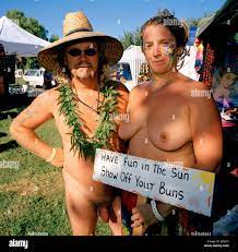 As Nudestock is a naked music festival individuals use flamboyant  accessories to decorate their bodies Stock Photo - Alamy