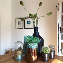 tafel decoreren stylen vaas pot fles cactus tafels decoreren wijnvaten decoreren