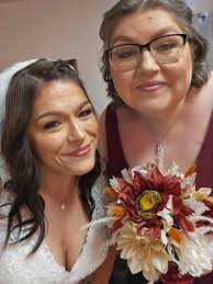 Can someone add angel wings to my son's picture?