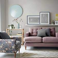A modern sofa, contemporary coffee tables or armchair can make or break the outcome of any room. Floral Print Armchair And Pink Sofa In Modern Living Room Floral Armchair Living Room Arm Chairs Living Room Furniture