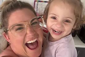 Fundraiser for Emily McKeating by Katie Kingston : Emily helping to care  for Hope