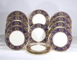 Check spelling or type a new query. 12 Royal Doulton Cobalt Blue Dinner Plates With Elaborate Raised Paste Gold Rose Medallion Decoration Dinner Service Plates Elise Abrams Antiques