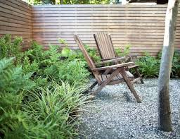 Modern Courtyard Garden Seattle Adirondack Chairs Cedar Fence Decomposed Granite Ferns Grasses Modern Courtyard Modern Landscaping Outdoor Landscaping