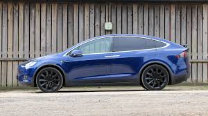 I was tapping away raising and lowering the suspension height and adjusting the steering from. New Tesla Model X 2021 Review Car Magazine